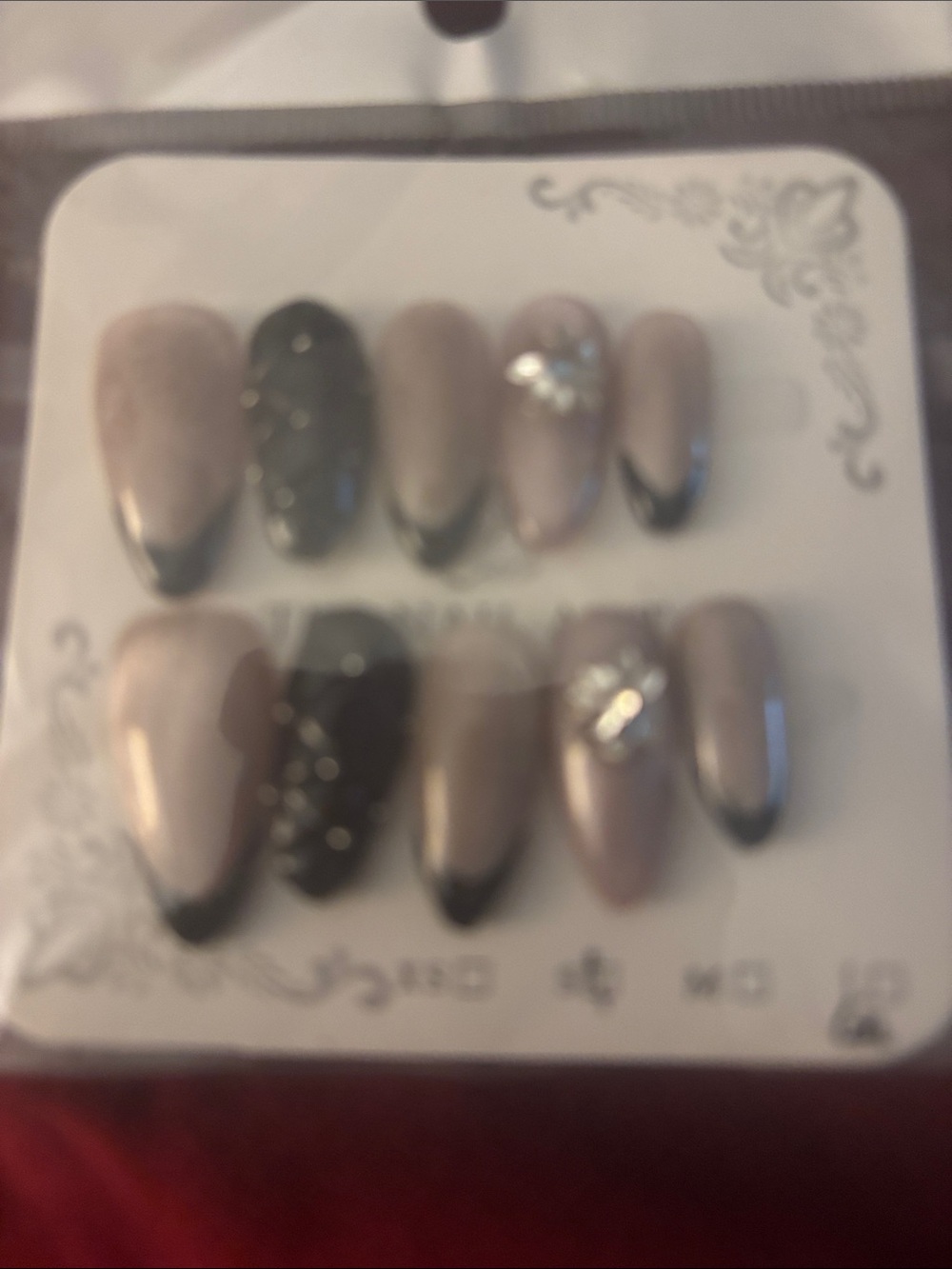 Neutral Almond Press-On Nails with Black Tips and Accent Gems